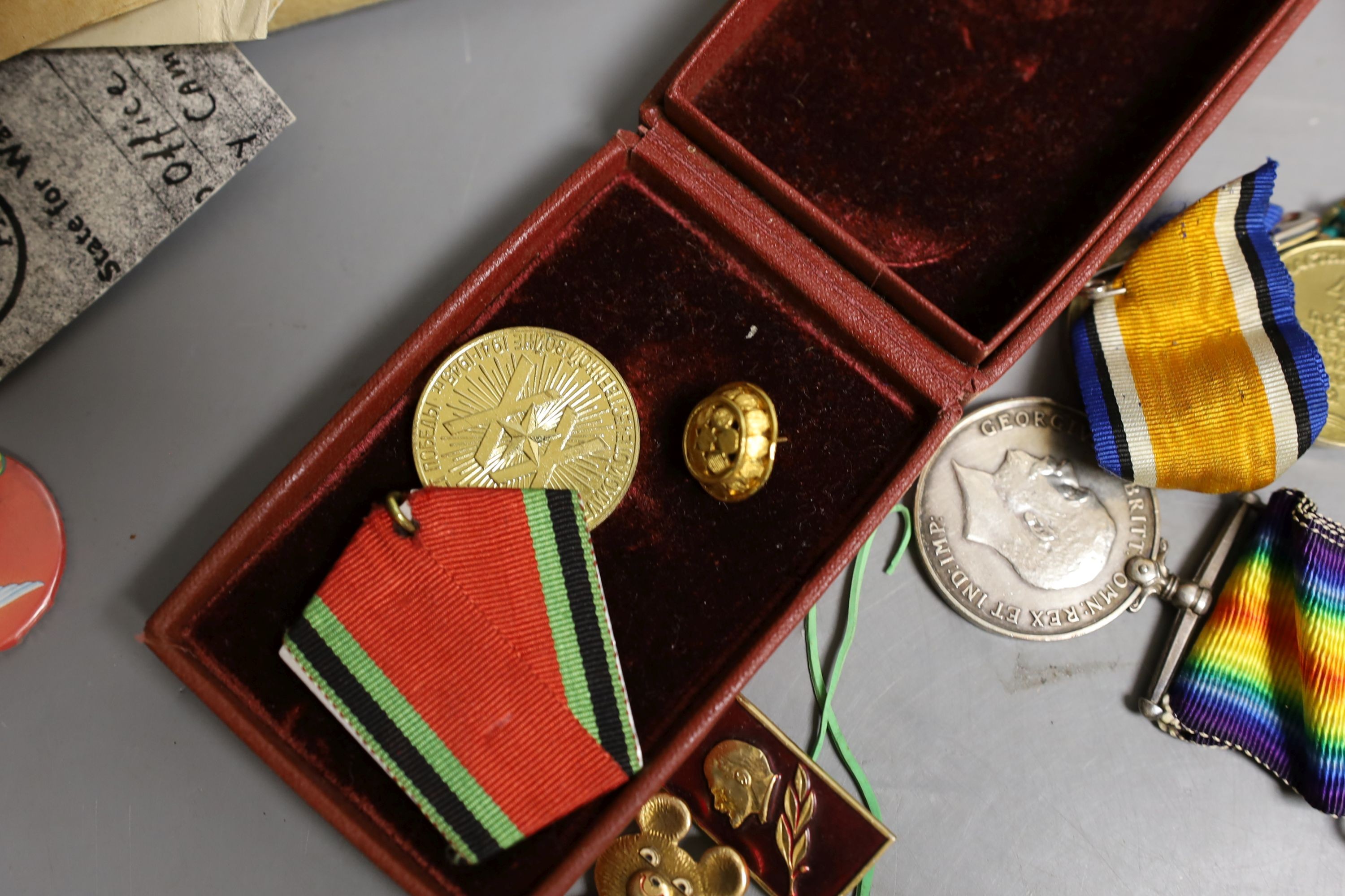 Three pairs of Polish Army shoulders pads, four U.S.S.R, Jubilee Medals, buttons, brooches and WWI medal group to Pte. G. Huggett, Royal Sussex Regiment, a WWII war medal and a USSR WWII 'Stalin' Medal.